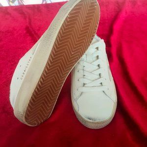 Super-Star with a suede star and peach-pink glitter heel tab